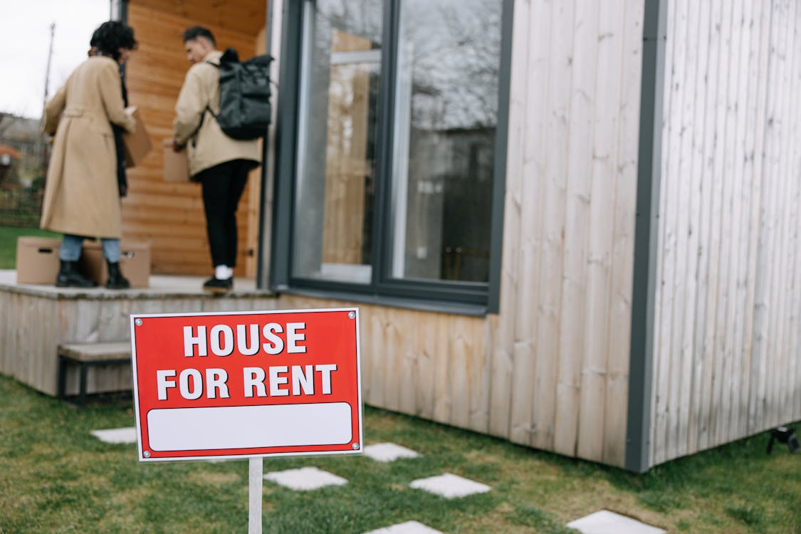 renting vs buying a home in today’s market featuring house for rent sign