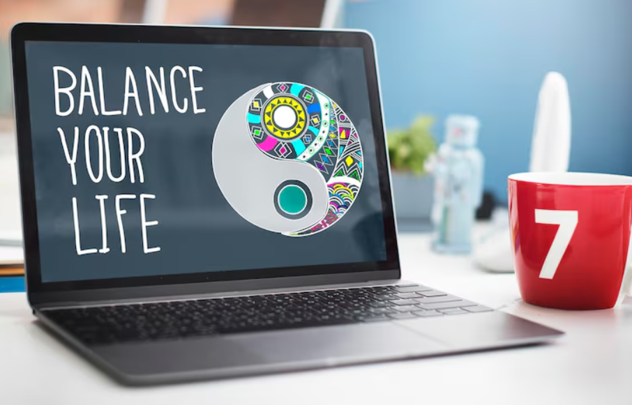 Laptop displaying balance concept while considering whether to take a pay cut