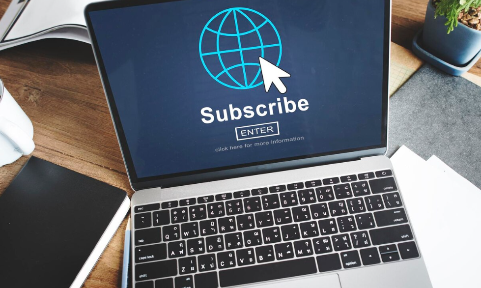 Laptop screen showing subscribe prompt illustrating subscription services pros and cons.