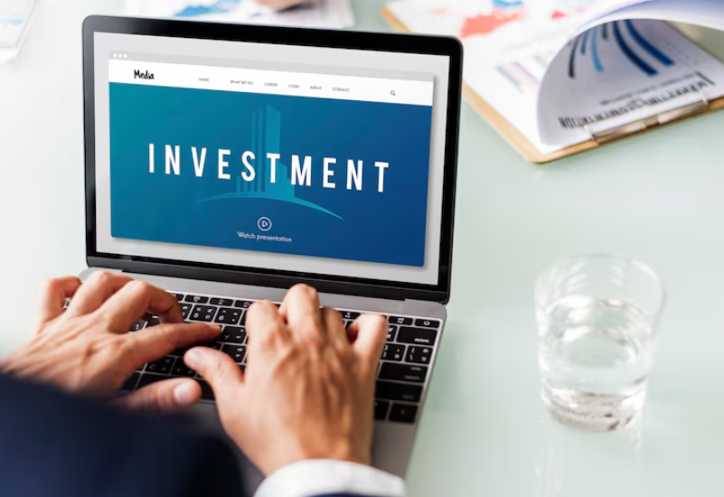 Investor reviewing investments to decide when to rebalance your investment portfolio.